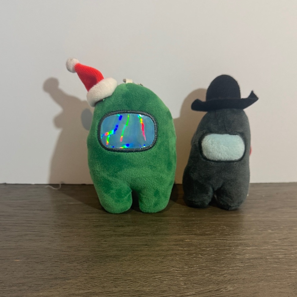 Among us keychain lot of 2 black and green